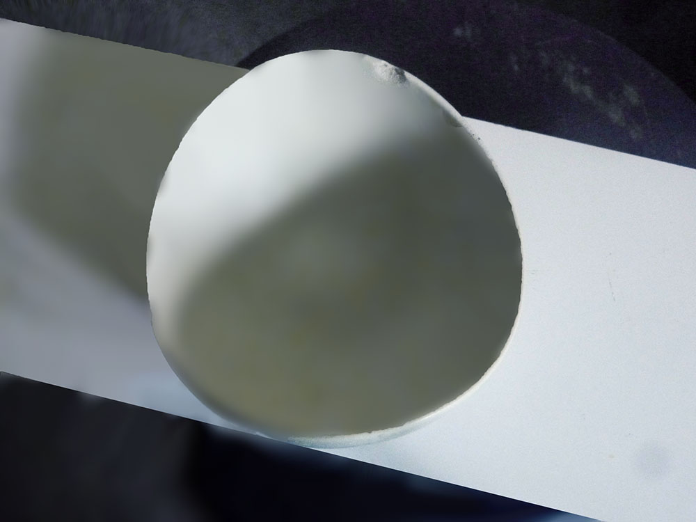 A very delicate, thinly cast dish in soft creamy white glaze, carefully crafted by hand by Westin Neil Andersen. Chip in the rim.
