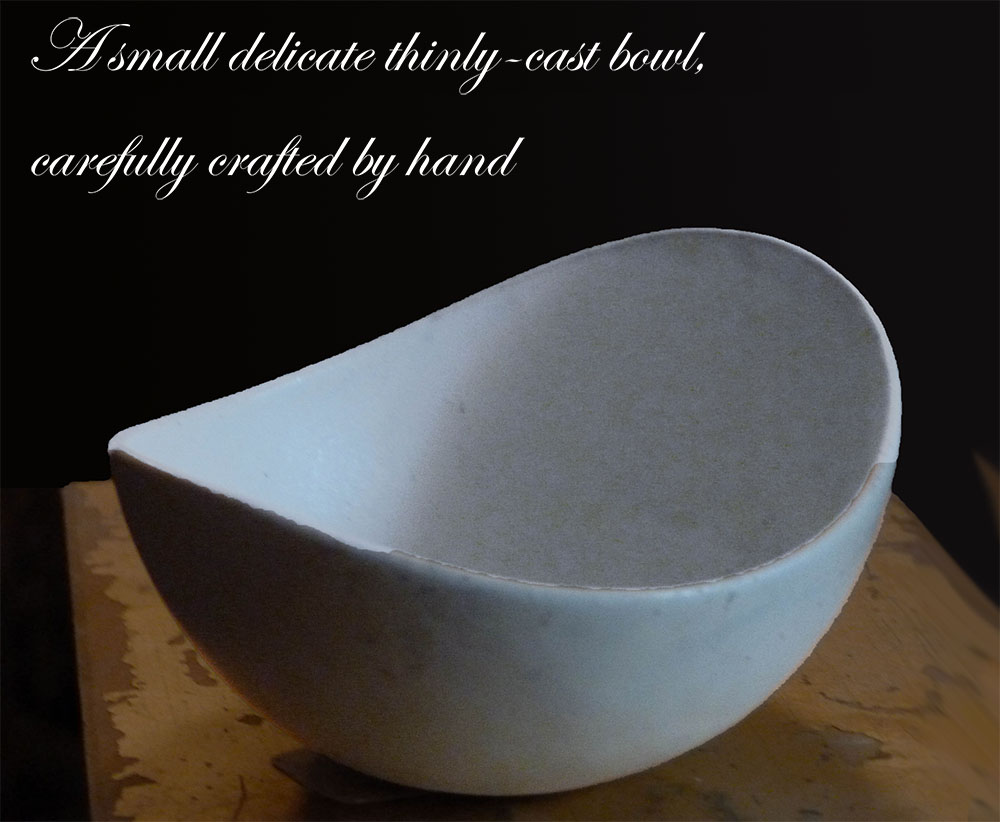 A very delicate, thinly cast dish in soft creamy white glaze, carefully crafted by hand by Westin Neil Andersen. Chip in the rim.